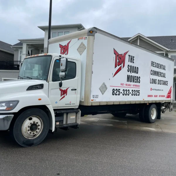 The Squad Movers truck at a home during a full-service move in Edmonton
